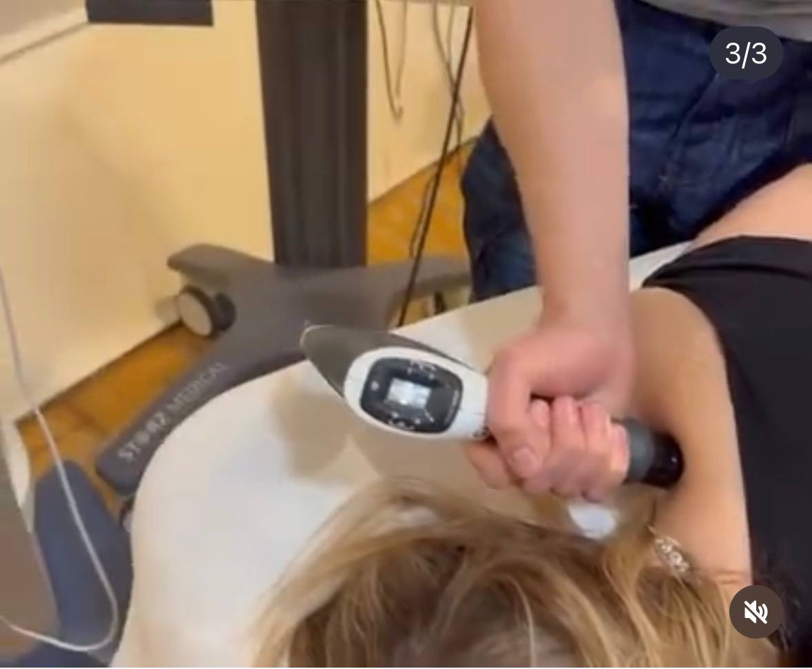 Shockwave therapy treatment in progress